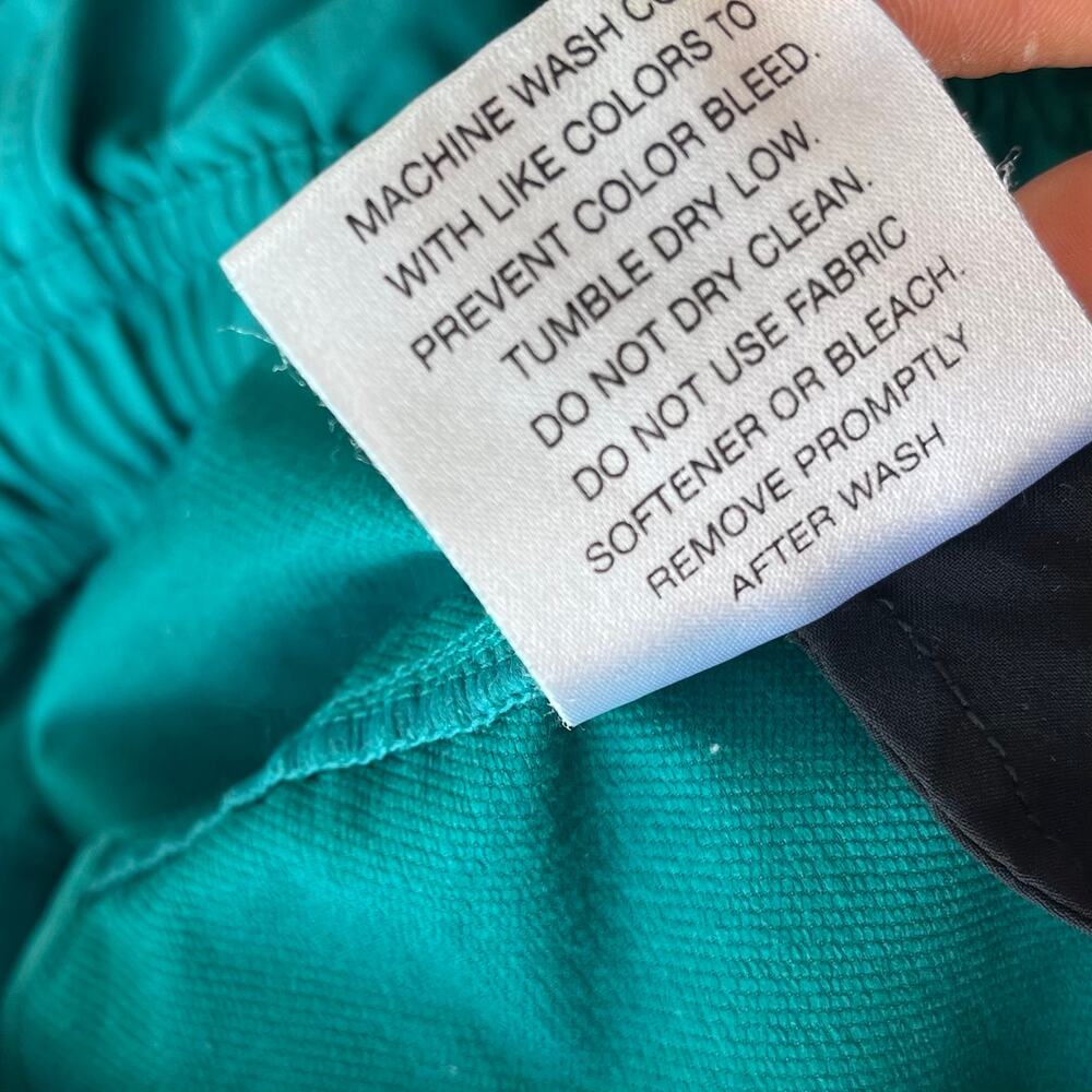 JANJI Women's 4" Transit Tech Shorts Teal Everyday Travel Athletic - Picture 5 of 5